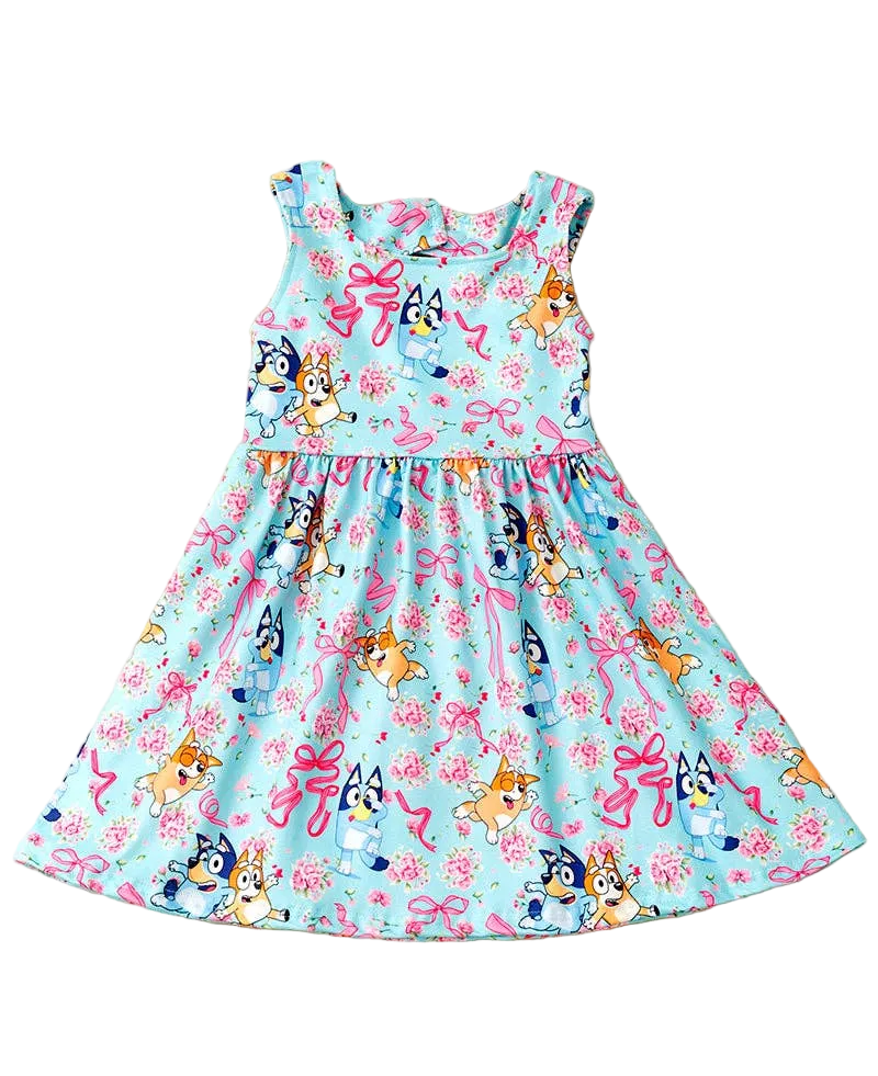 Lt. blue Multi - printed character dress with open back and bow. - Adalynn Leanne