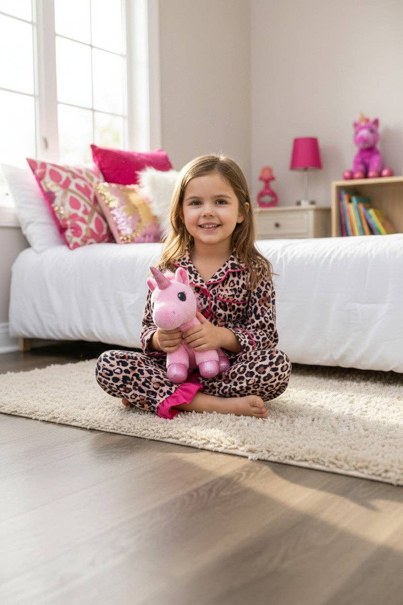 Animal printed pajamas with fuchsia hem.