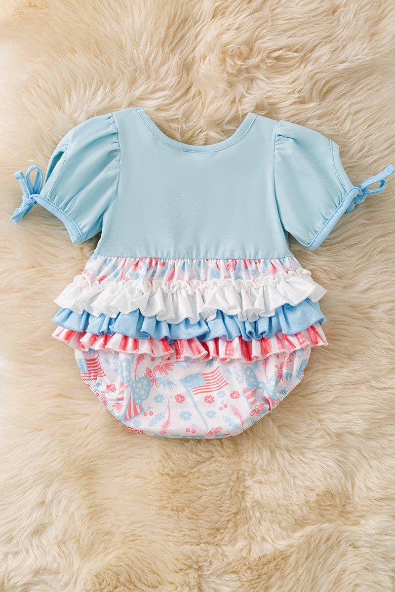 Baby blue multi - printed patriotic baby romper. RPG60554 AMY - Adalynn Leanne