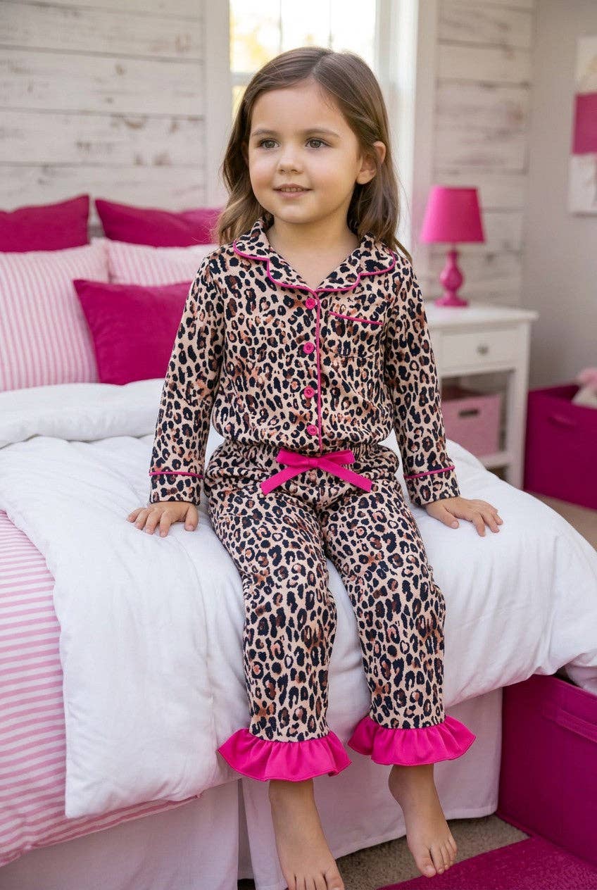 Animal printed pajamas with fuchsia hem.