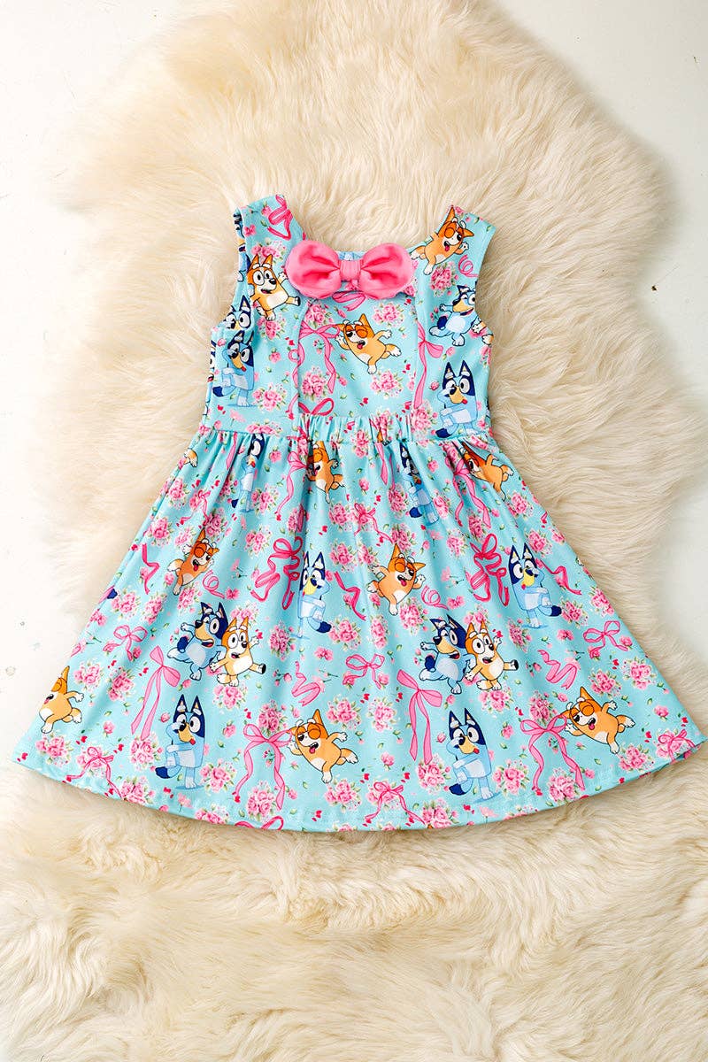 Lt. blue Multi - printed character dress with open back and bow. - Adalynn Leanne